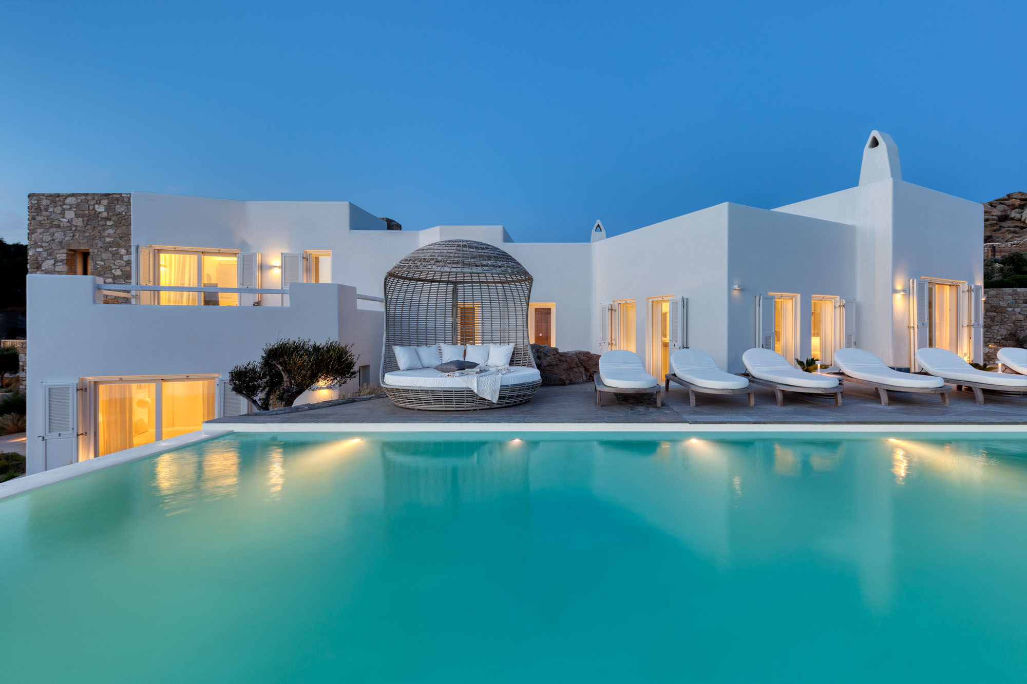 Villa Oleandra at twilight with infinity pool