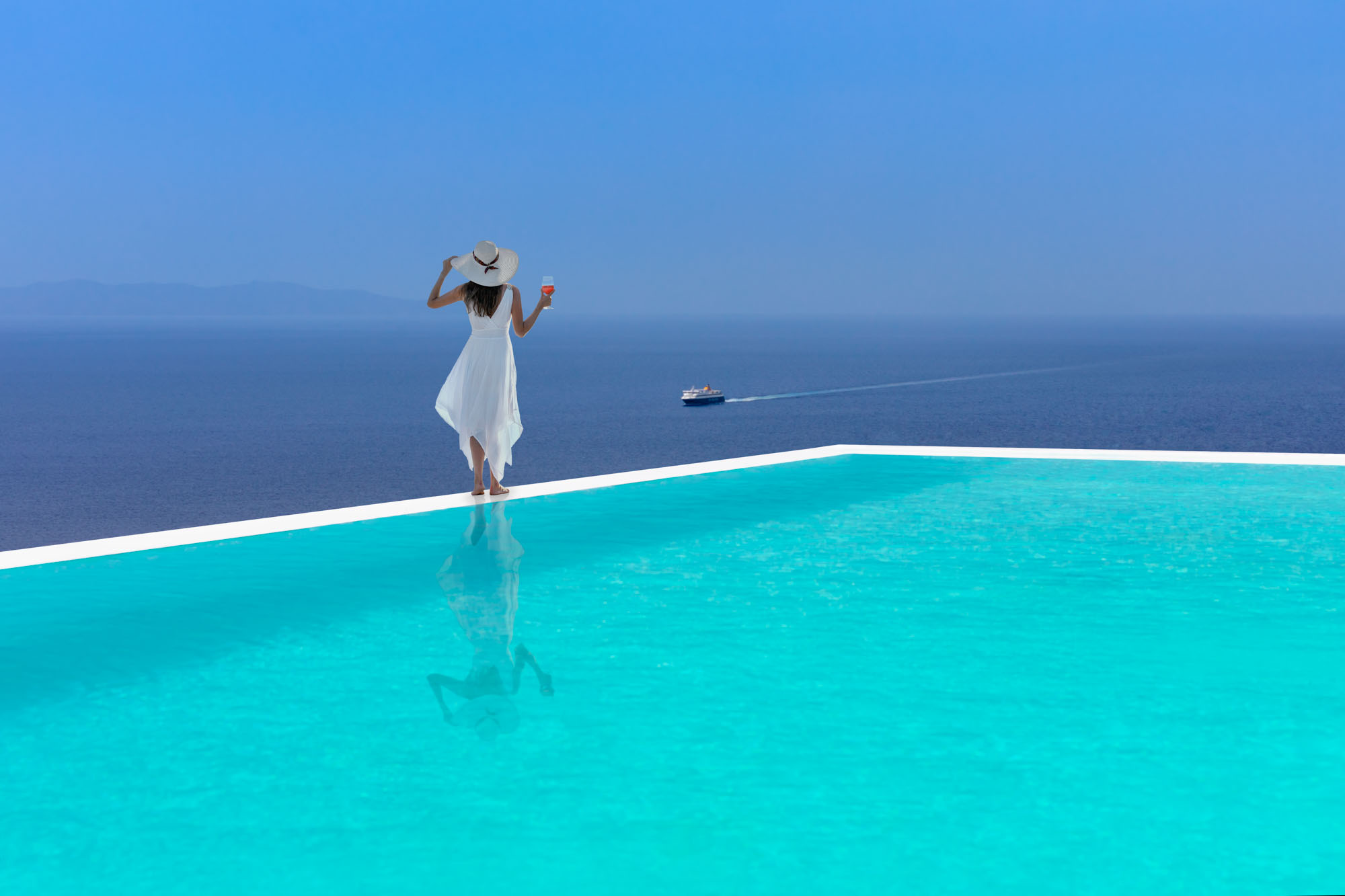 Woman at infinity pool