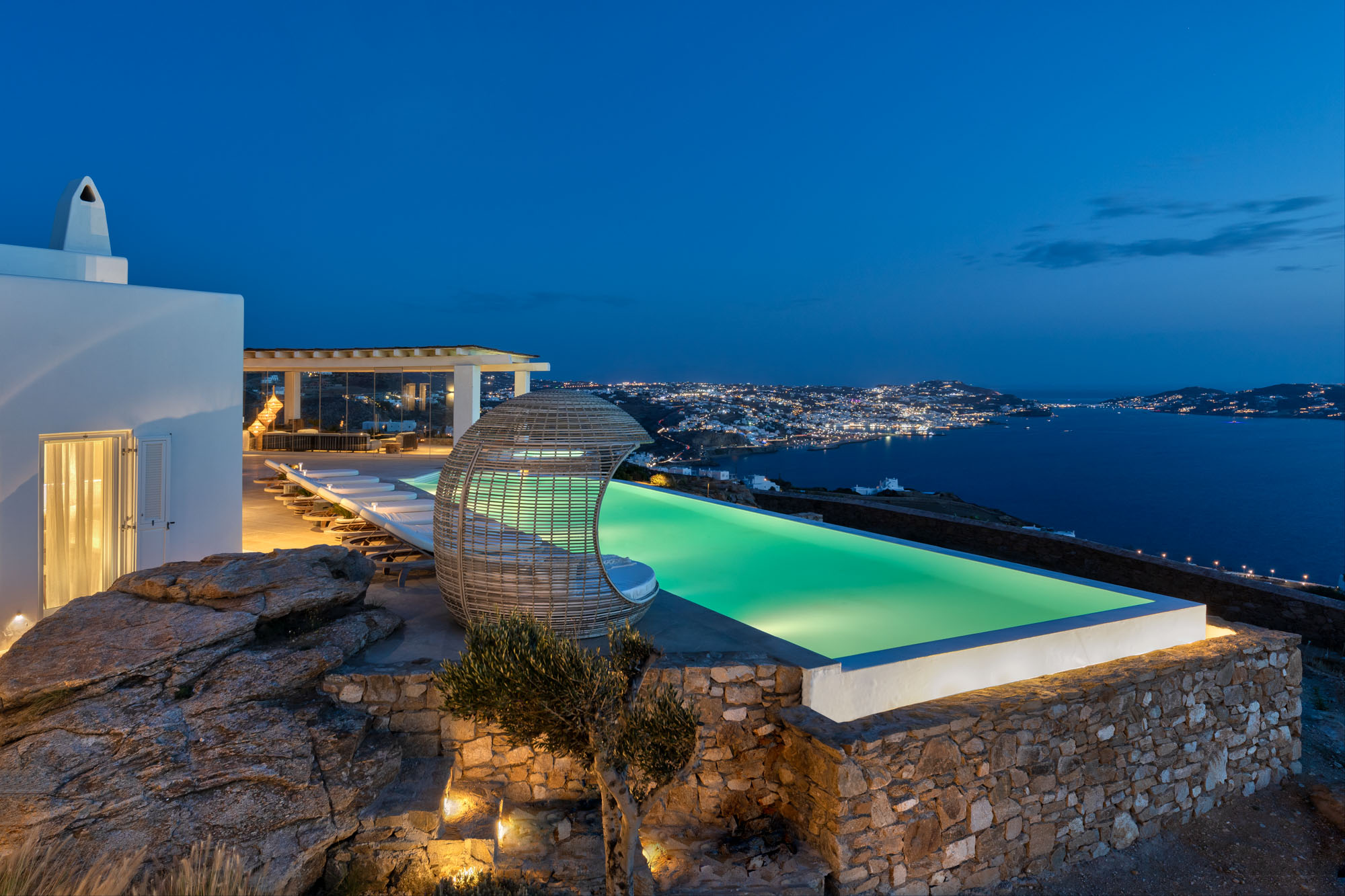 Villa and pool at night